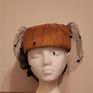Sonni California tulle hat with large bow accent